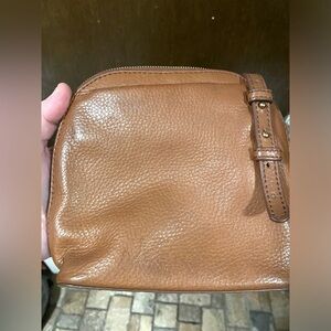 Hobo Nash crossbody bag pre-loved condition. Leather tassel gold hardware.